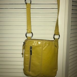Hobo International Crossbody leather bag in vibrant yellow.